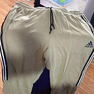 Adidas men’s Khaki Joggers with Black Stripes